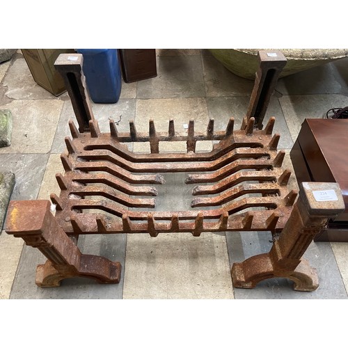 234 - A large cast iron fire grate