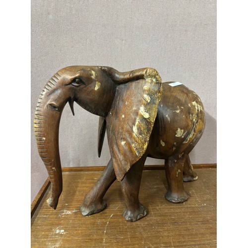 307 - A teak figure of an African elephant