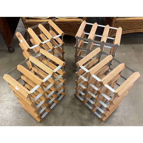 239 - Four pine and metal wine racks