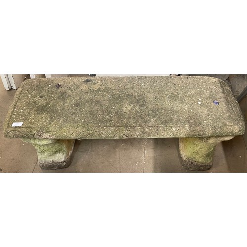 242 - A concrete garden pedestal bench