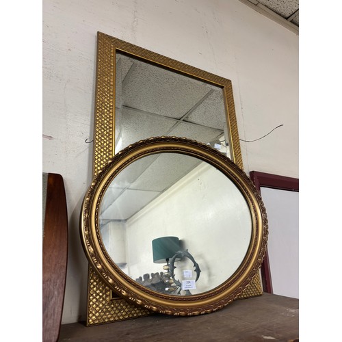 314 - An oval gilt framed mirror and one other