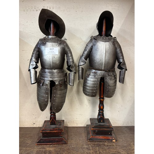 317 - Two miniature medieval style suits of armour on stands