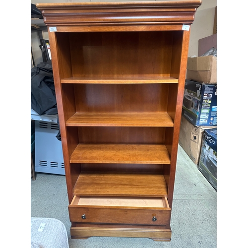 1469 - A cherry wood bookcase with drawers