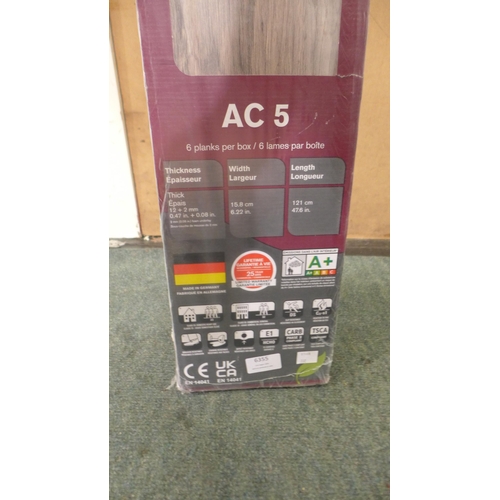 6355 - 4 packs Of  grey Walnut Laminate Flooring (332-2-5) *This lot is subject to vat