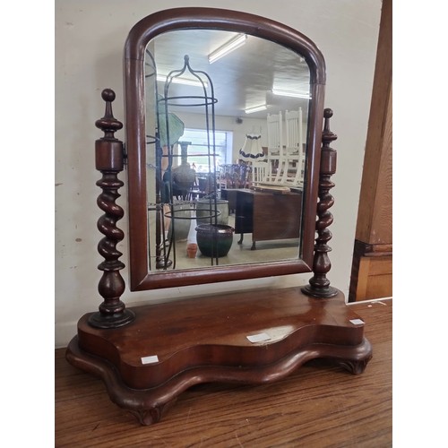 325 - A Victorian mahogany barleytwist toilet mirror