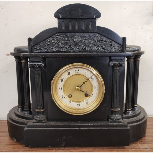 322 - A 19th Century French Belge noir architectural cased mantel clock