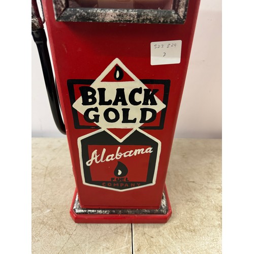 2061 - A Black Gold Alabama Fuel Company model fuel pump with shelves inside