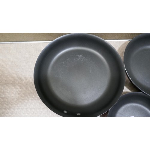 6299 - Three Mixed Tramontina frying pans (322-549) *This lot is subject to Vat