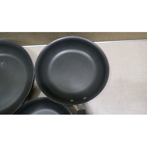 6299 - Three Mixed Tramontina frying pans (322-549) *This lot is subject to Vat