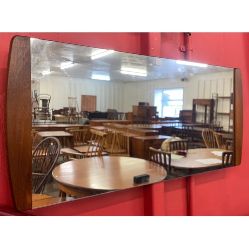 105 - A teak framed mirror