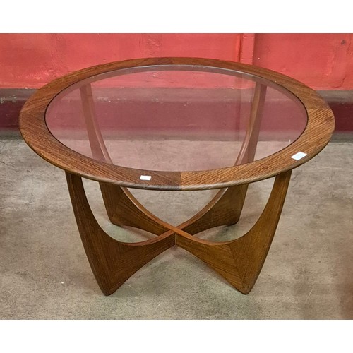 12 - A G-Plan Astro teak and glass topped circular coffee table