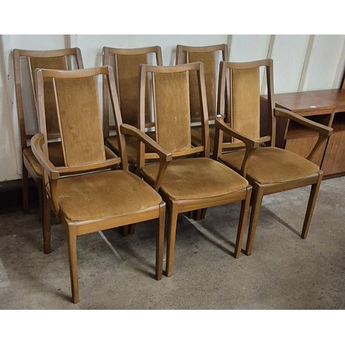 17 - A Nathan teak circular dining table and six chairs