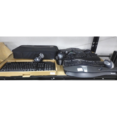 2058 - A quantity of PC keyboards and mice including a Microsoft Natural Wireless Ergonomic keyboard 7000 a... 