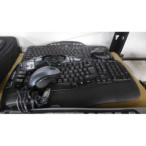 2058 - A quantity of PC keyboards and mice including a Microsoft Natural Wireless Ergonomic keyboard 7000 a... 