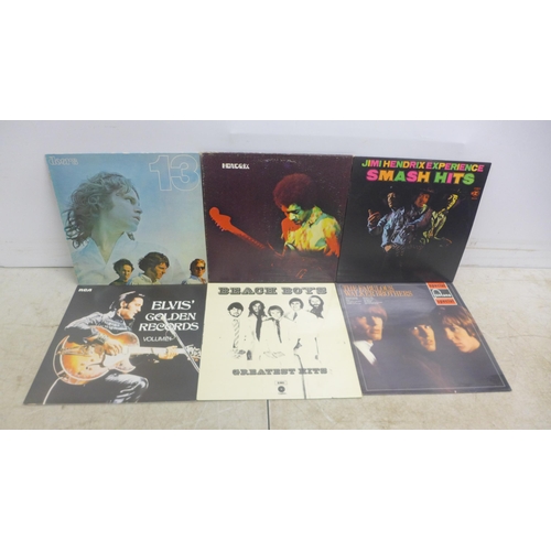 2074 - 12 various LP records including Jimi Hendrix, The Doors, The Byrds, Elvis, Beach Boys, etc.