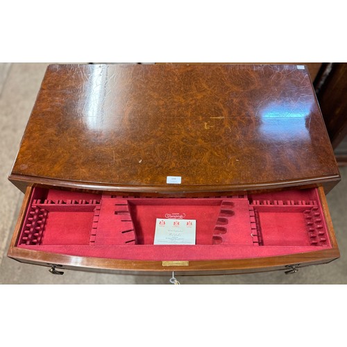 144 - A large Queen Anne style walnut and mahogany canteen chest of drawers