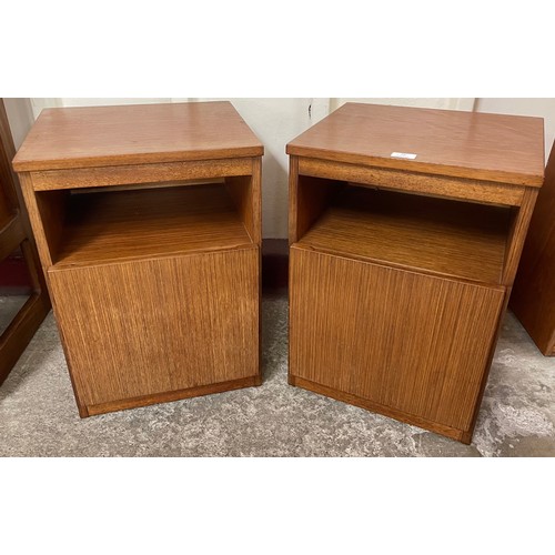 29 - A pair of Meredew teak bedside cabinets