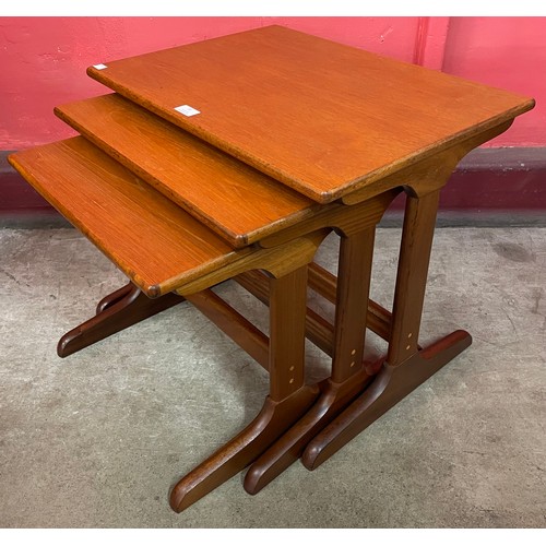 38 - A teak nest of tables