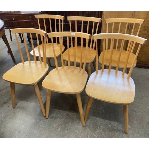 42 - A set of six beech dining chairs