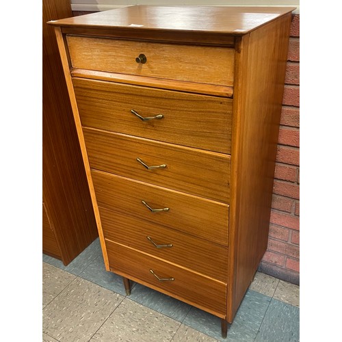 44 - A teak chest of drawers