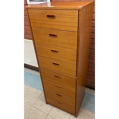 54 - A teak chest of drawers