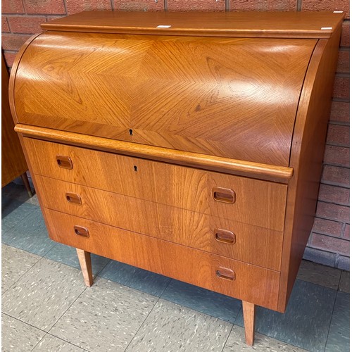 55 - A Swedish SMI teak cylinder bureau, designed by Egon Ostergaard