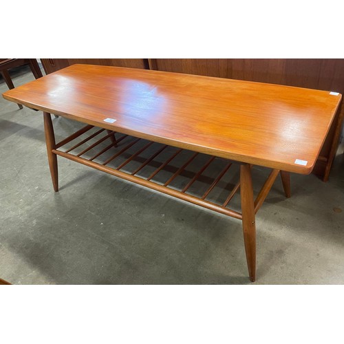 59 - A teak and walnut coffee table