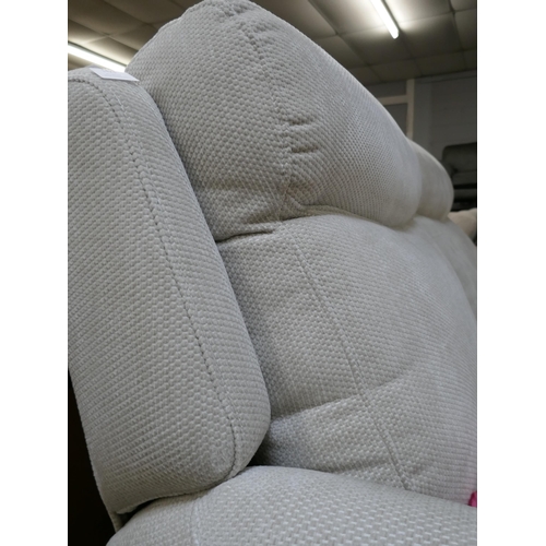 1375 - An ivory textured velvet electric reclining two seater sofa