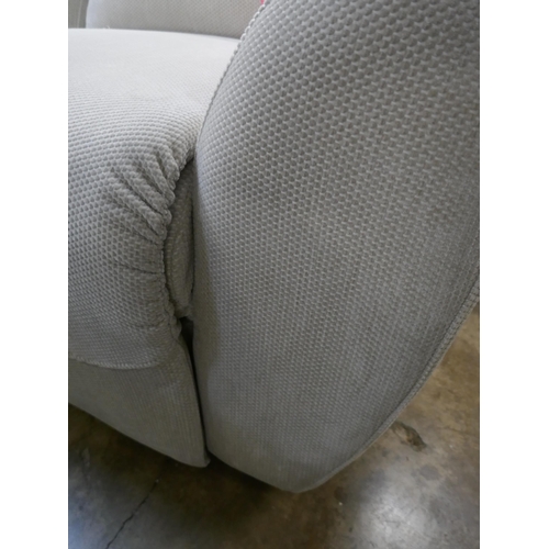 1375 - An ivory textured velvet electric reclining two seater sofa