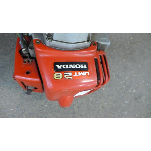 2183 - A Honda UMT228 petrol strimmer