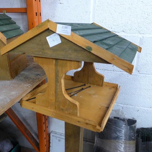 2186 - A bird table, a hanging bird table and nest box