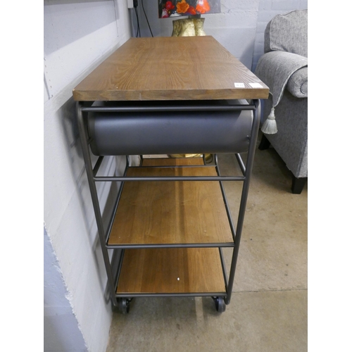 1309 - An industrial style wood and metal two drawer sideboard on wheels