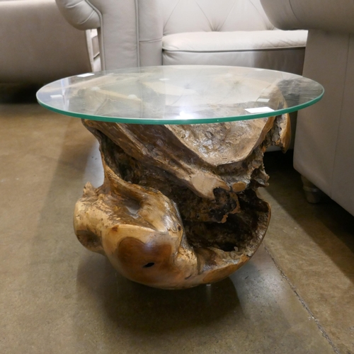 1319 - A teak driftwood occasional table