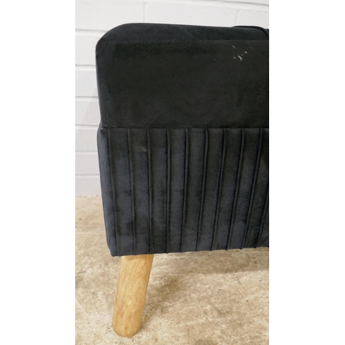 1370 - A black velvet upholstered storage stool