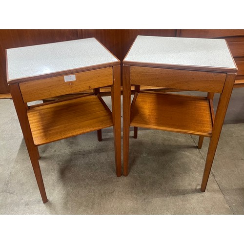 62 - A pair of Remploy teak and Formica topped bedside tables