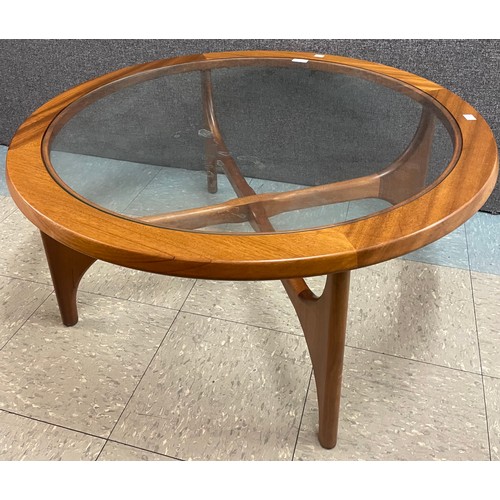 63 - A Stonehill Stateroom teak and glass topped circular coffee table