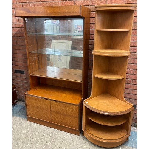 64 - A teak and glass room divider and a teak corner cabinet