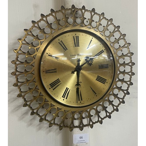 66 - A London Clock Company circular gilt metal wall clock