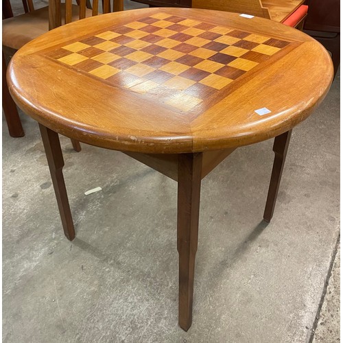 76 - A teak games table