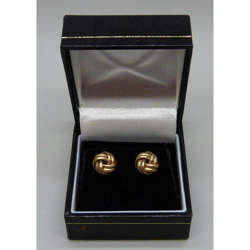 1000 - A pair of 9ct gold knot earrings with butterflies, boxed, 0.5g