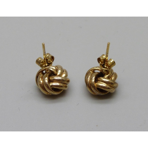 1000 - A pair of 9ct gold knot earrings with butterflies, boxed, 0.5g