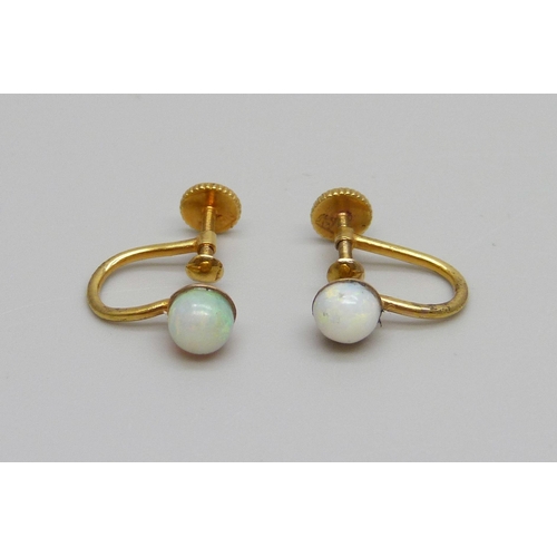 1007 - A pair of 15ct gold and opal screw-back earrings, a/f, 1.7g