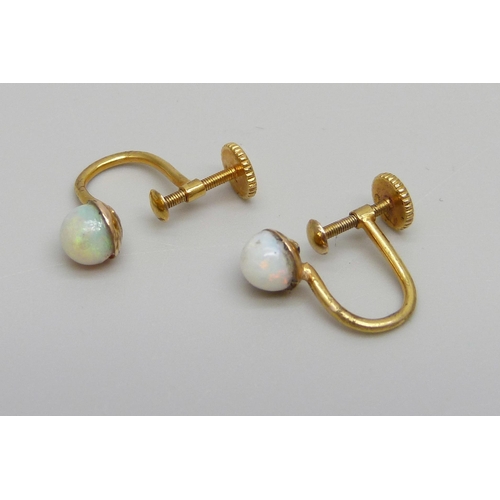 1007 - A pair of 15ct gold and opal screw-back earrings, a/f, 1.7g