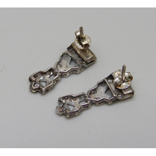 1017 - A pair of white metal Art Deco and diamond set earrings, possibly converted from a wristwatch, boxed... 