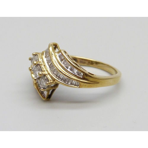 1018 - A 10k gold and diamond set ring, 3.2g, N/O