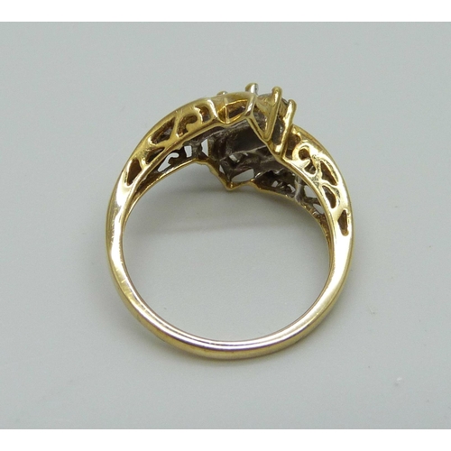 1018 - A 10k gold and diamond set ring, 3.2g, N/O