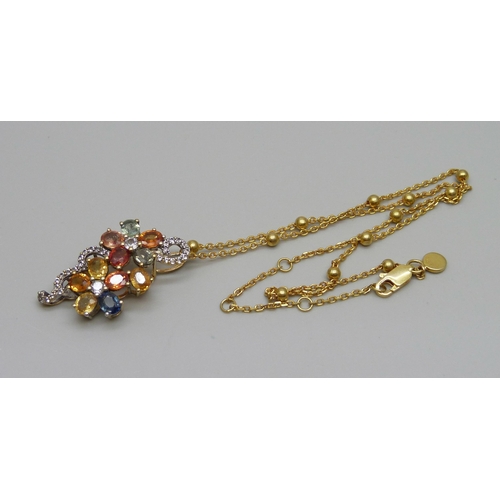 1019 - A silver gilt and multi gem pendant and chain