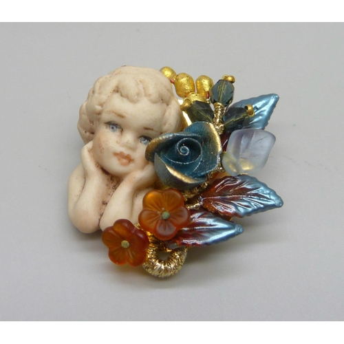 1030 - A Butler and Wilson brooch, 4cm