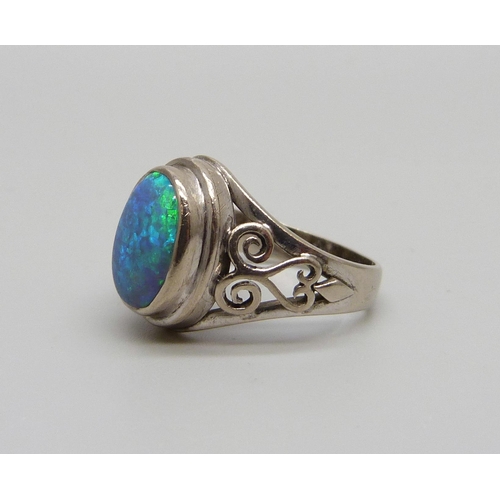 1034 - A white metal and opal ring, L