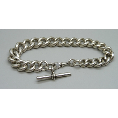 1050 - A heavy silver large curb link watch chain, 163g, 32cm